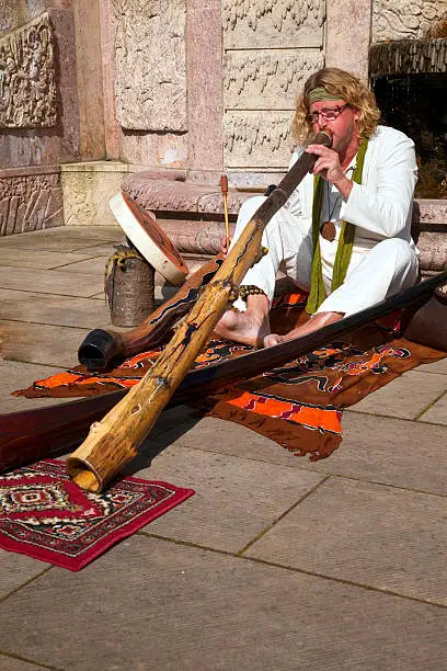 didgeridoo player at historic marketsee also: