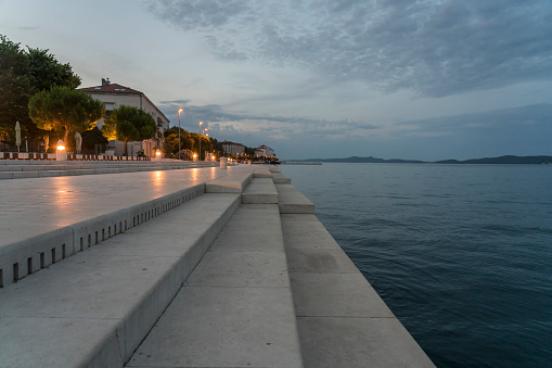 Night view at coastal town Zadar and famous landmark on city promenade, you can listen to the music of waves, Croatia Europe.