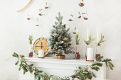 Christmas decorations on the fireplace. Mantelpiece