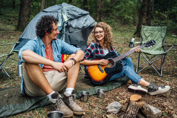 istock Happy couple on camping in nature 1835344366