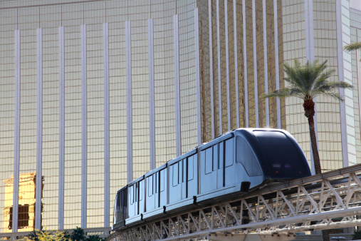 Monorail in front of luxurious hotel faAade. Similar pictures are in this lightbox:
