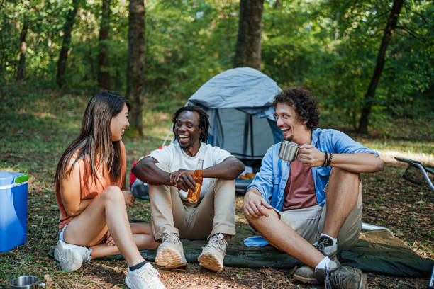 istock Friends camping in the forest together 1835347088