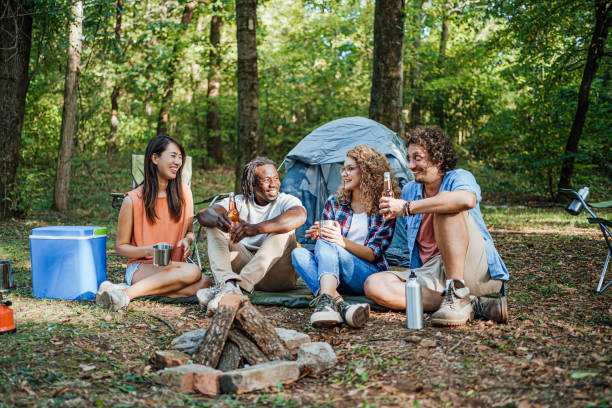 istock Friends have a great time while camping in nature 1835349702