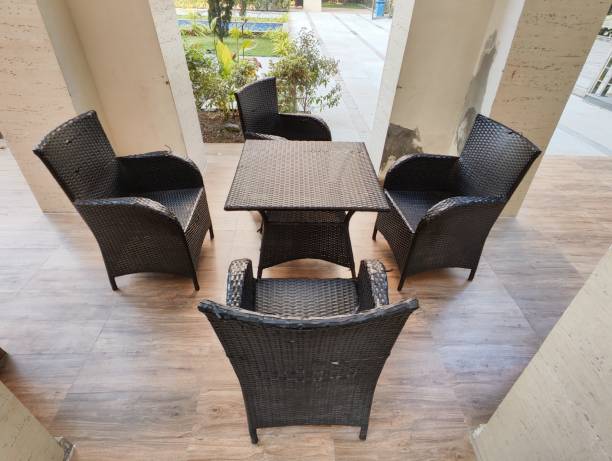 istock Seating area in a garden with chairs and table 1835350836
