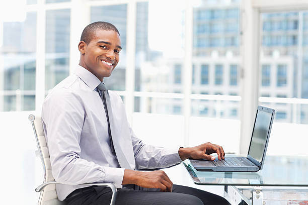 istock Young Businessman Working on a Laptop 183535501