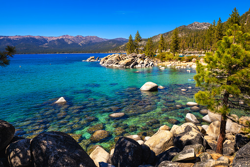 Sand Harbor Beach at Lake Tahoe, Nevada State Park, with Sierra Nevada Mountains in the background.