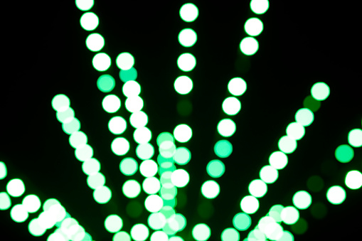 Green colored blurred light dots