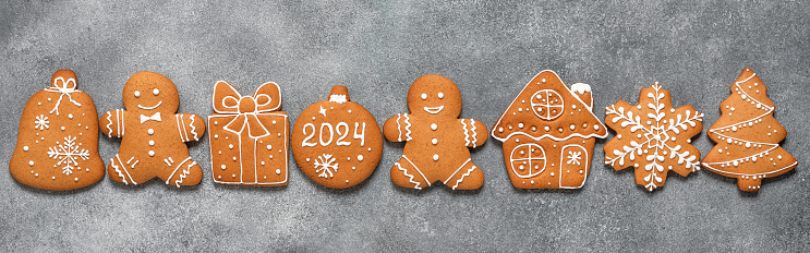 Border of Christmas gingerbread cookies. Gingerbread collection. Top view, flat lay. Banner.