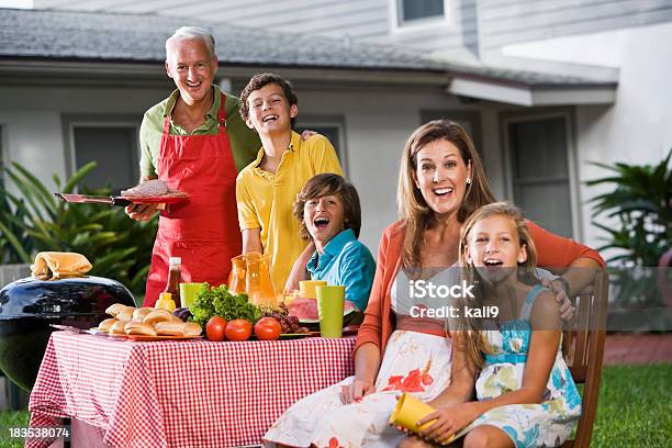 Portrait Of Family Enjoying Backyard Barbecue Stock Photo - Download Image Now - Fun, Mature Men, 10-11 Years