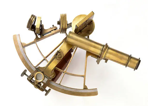 Brass Sextant on white.See more in this Lightbox:
