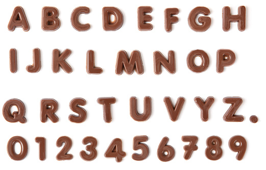 Chocolate Alphabet on white with clipping path. Clipping path excludes the shadows.