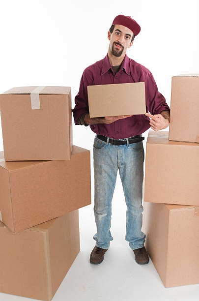 istock Polite delivering Man with hat on moving 183538824