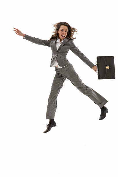 istock Young business woman jump 183539190
