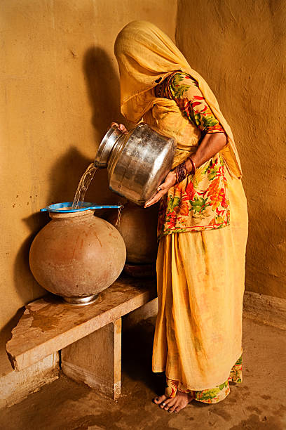 istock Indian woman carrying water 183539431