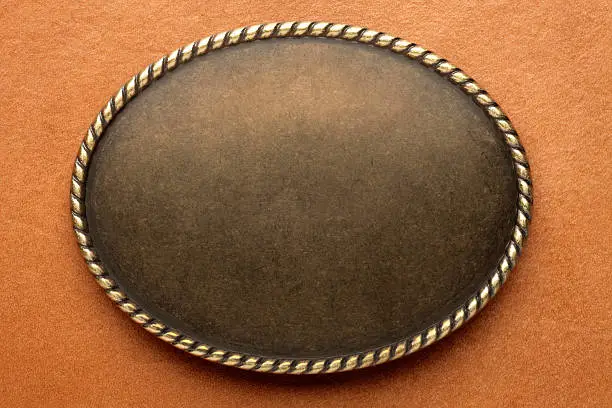 An western style oval frame with.  Add your own text.