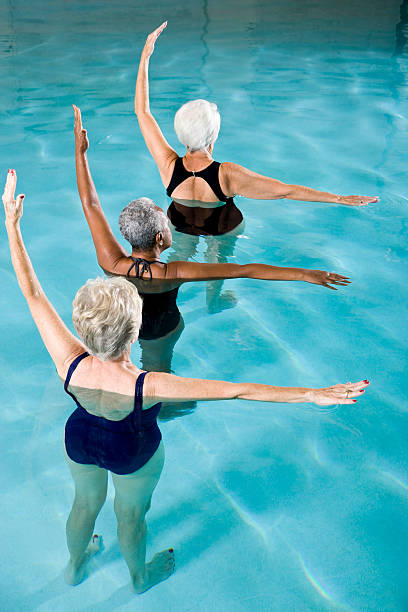 istock Multiracial senior women in water aerobics class 183541437