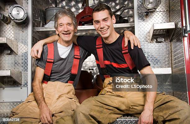 Father And Son Firefighter Stock Photo - Download Image Now - Firefighter, Father, Senior Adult