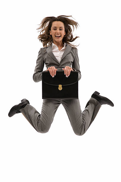 istock Young business woman jump 183542937