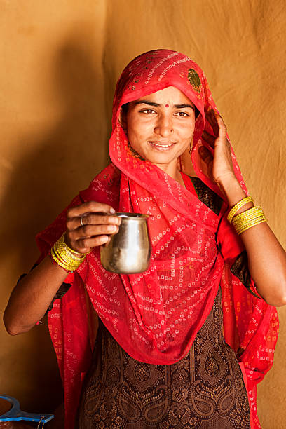 istock Indian woman drinking cold water 183543356