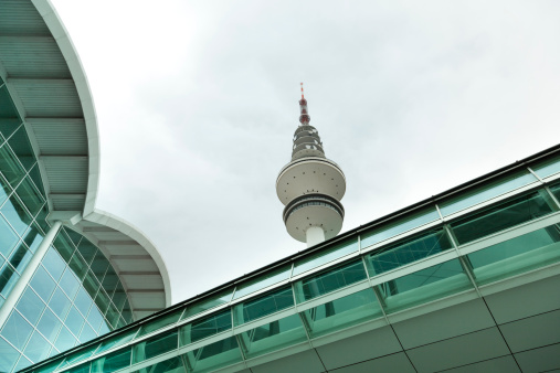 hamburg television tower with modern glass facade exibition center.