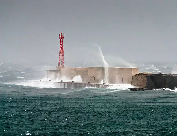 Photo of lighthouse in the storm