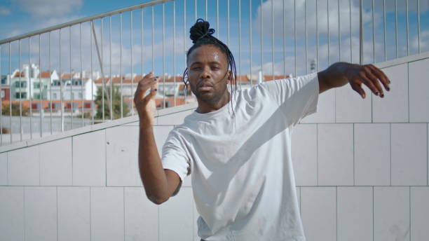 istock Inspired man moving arm closeup. Passion dreadlocks guy creating choreography 1835455794