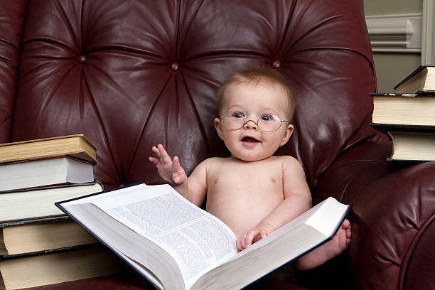 Cute Baby Reading a Book stock photo