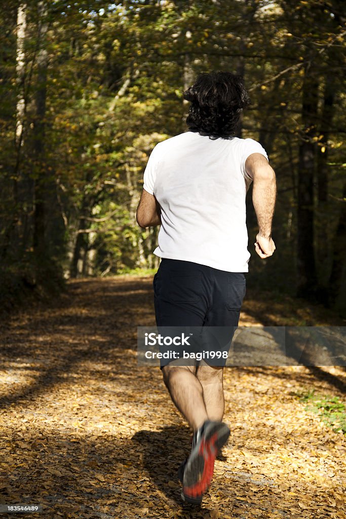 Corriendo en el bosque - Foto de stock de Actividad libre de derechos