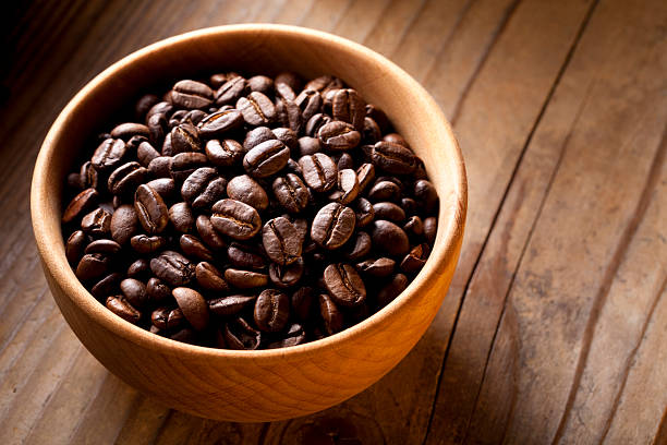 istock Coffee beans in wooden bowl 183546920