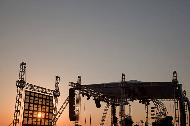 istock A silhouette of a concert stage at sunset 183547131