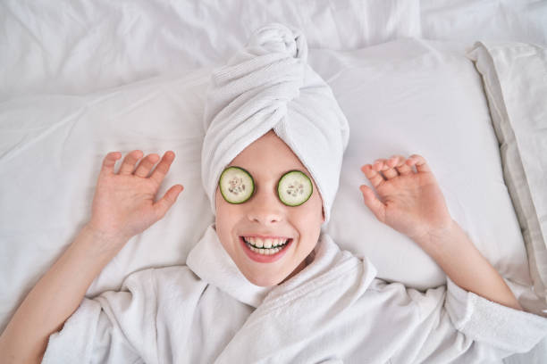 istock Playful child enjoying spa procedures at home 1835475138