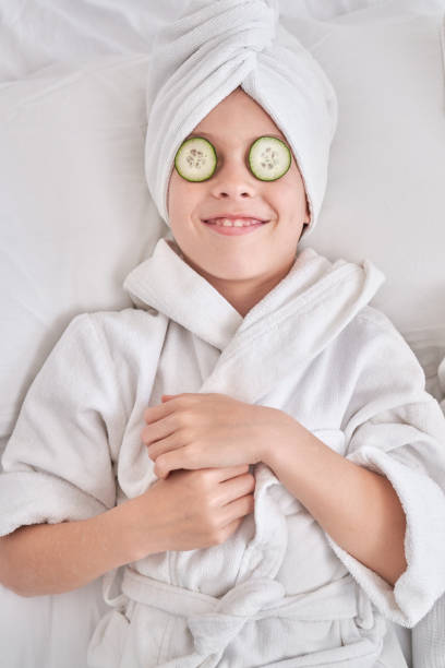 istock Happy boy resting during spa procedures at home 1835475684