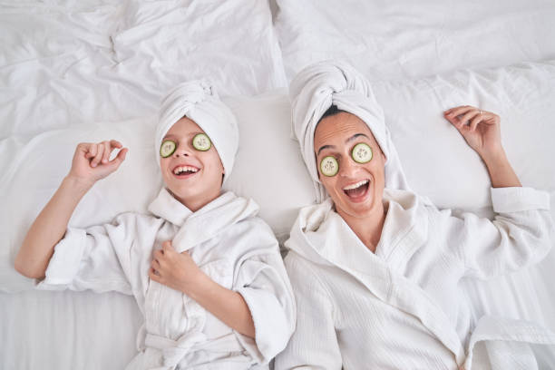 istock Mother and son during spa procedures at home 1835478451