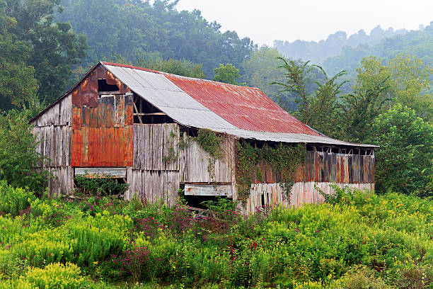 Barn with an American flag painted on the side.