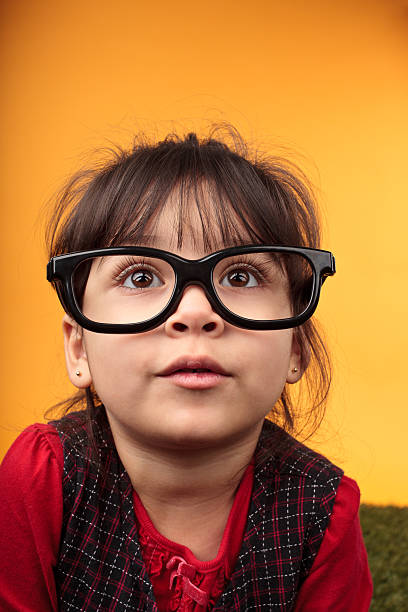 istock young girl with glasses 183550253