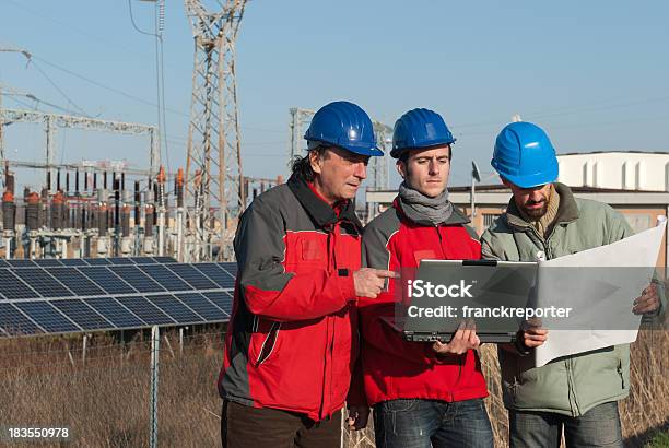 Technicians Engineer And Solar Panels On Laptop Stock Photo - Download Image Now - Adult, Adults Only, Blue-collar Worker