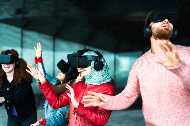 istock Young multiracial friends using futuristic virtual reality glasses - Technology and metaverse concept 1835519393