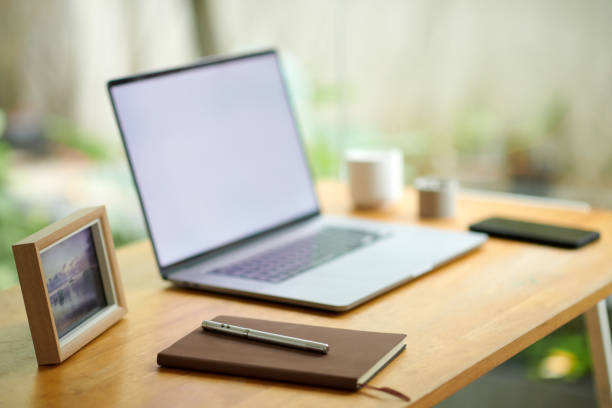 istock Planner and Pen next to Laptop on Desk 1835531052