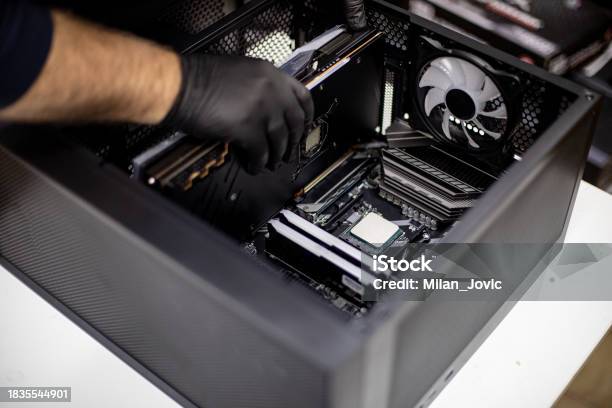Man Installing Computer Professional Man Repairing And Assembling A Computer Desktop Stock ...
