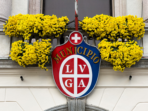 Lugano, Switzerland - December 12, 2023: Coat of arms and municipality of Lugano, the largest city in the Ticino holiday region.
