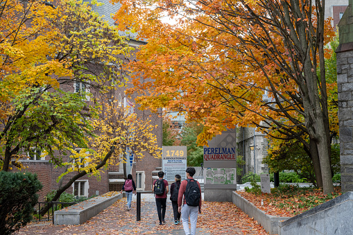 Philadelphia, USA - October 27, 2023. Students walking in the campus of University of Pennsylvania in Autumn, Philadelphia, USA