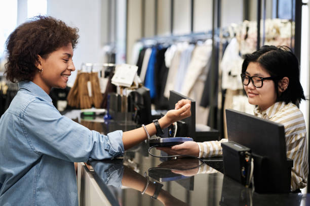 istock Woman Making Payment for her Purchases with Smartwatch 1835595017