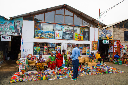Arusha,Tanzania, Africa.02 february 2022. African women sell handicrafts with national Tanzanian themes at Masai market in Arusha