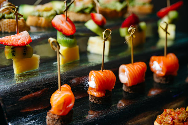 istock Fruit canape made from strawberries, kiwi, pineapple. 1835635534