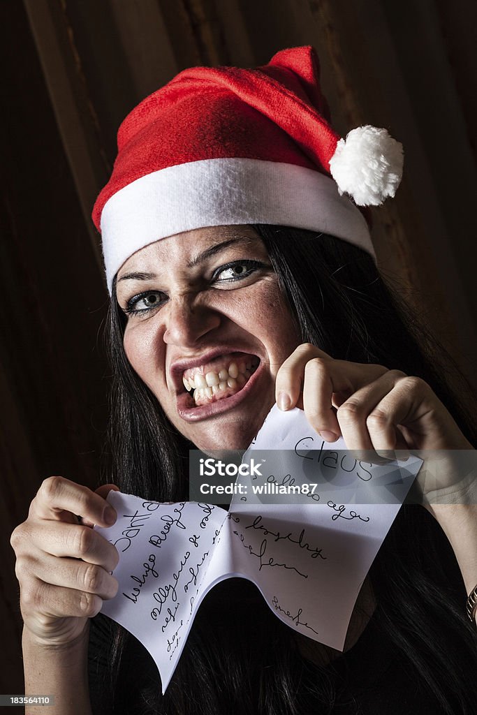 Bad Frau mit Weihnachtsmütze Zerstörung ein Buchstabe - Lizenzfrei Angst Stock-Foto