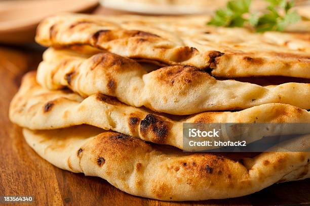 Closeup Photograph Of A Pile Of Plain Naan Flatbreads Stock Photo - Download Image Now