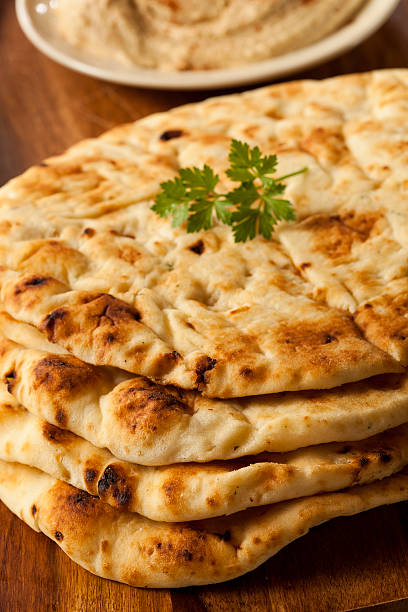 istock Homemade Indian Naan Flatbread 183564414