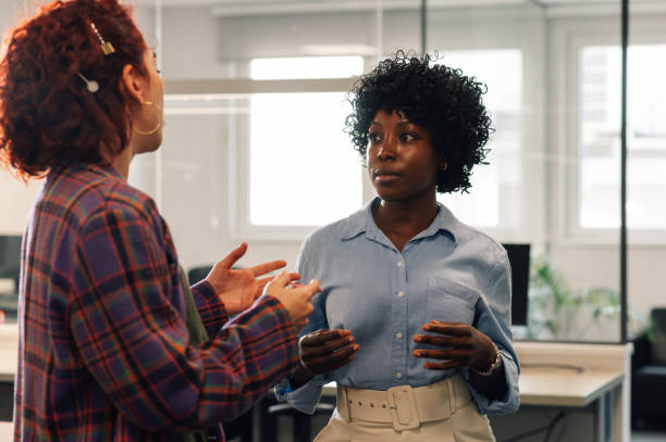 istock Portrait of a multicultural colleagues discussing at office. 1835663734