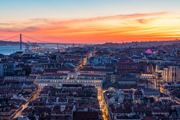 Overlooks the colorful old town Alfama of Lisbon city from old castle - Castelo de S. Jorge, Portugal Arco do Castelo, Lisbon, Portugal portuguese pavement stock pictures, royalty-free photos & images