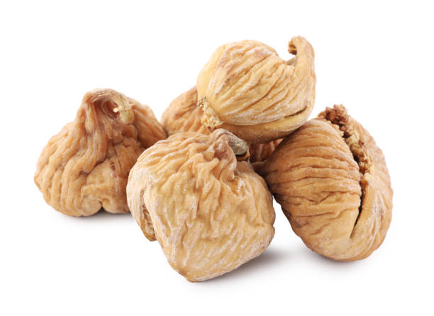 istock Many tasty dried figs isolated on white 1835732590